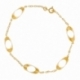 Bracelet en or jaune, motifs ovales ajourés - A